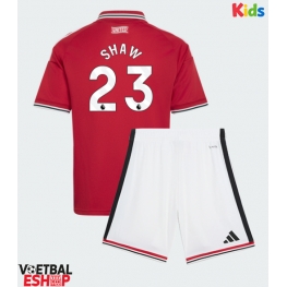 Manchester United Luke Shaw #23 Thuis tenue Kids 2026-27 Korte Mouw (+ Korte broeken)